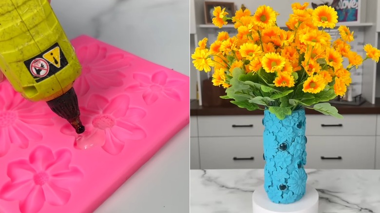 Orange flowers in a turquoise DIY floral vase on a marble countertop