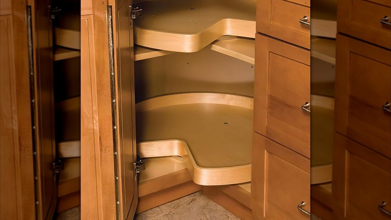 Rev-A-Shelf wooden lazy susan corner cabinet organizer in kitchen cabinet