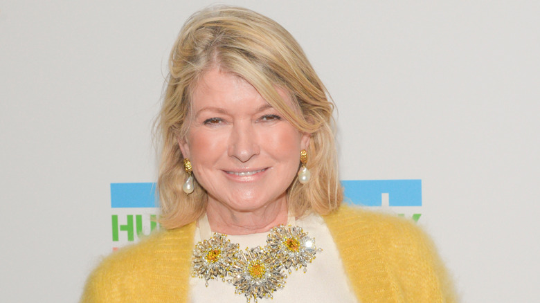 Martha Stewart smiles in yellow sweater