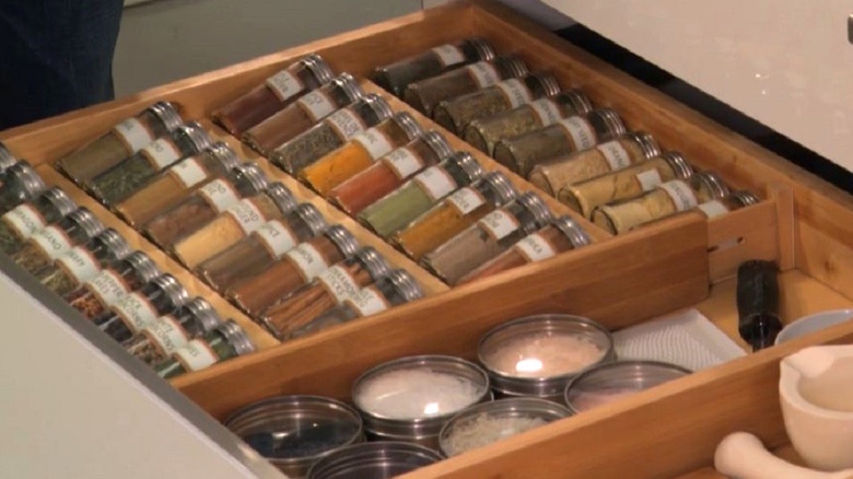 Spices in drawer using slanted shelves