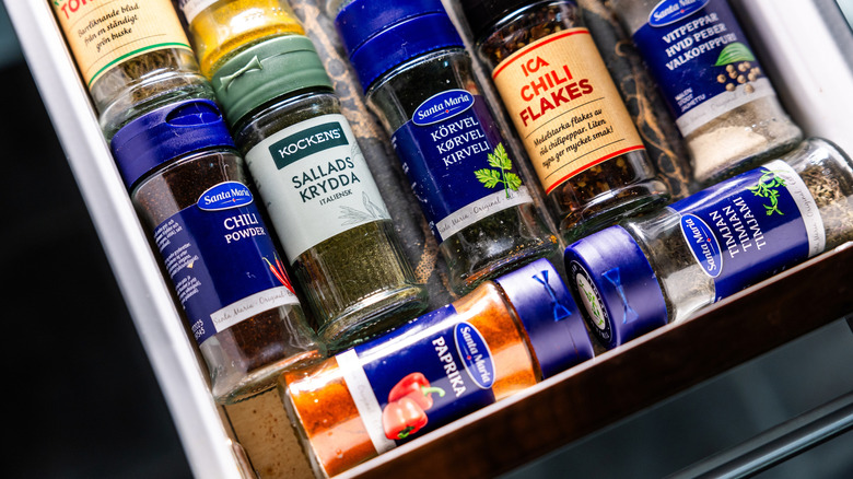 Spices lined up in drawer