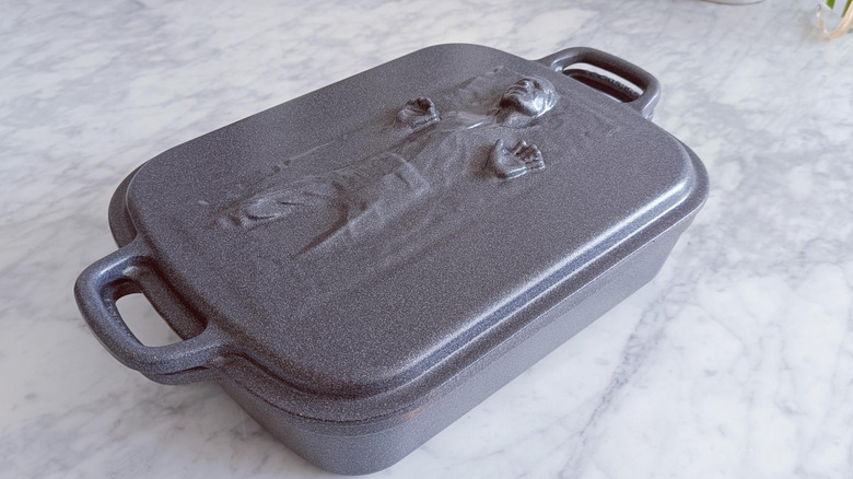Harrison Ford's image of Han Solo frozen in carbonite in the movie Star Wars