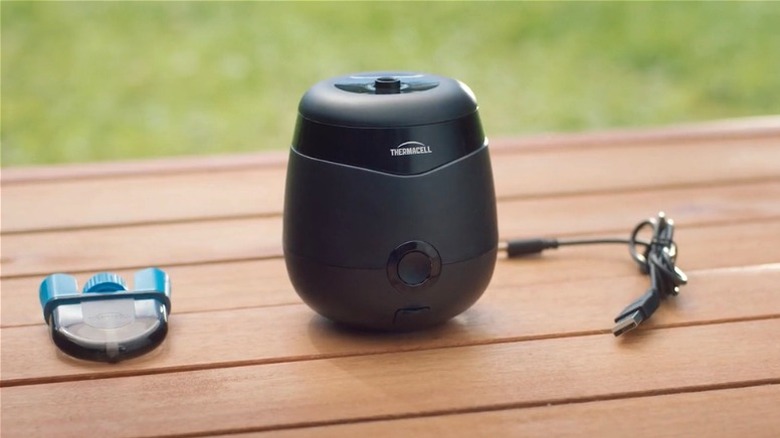 Thermacell mosquito repeller on a patio table