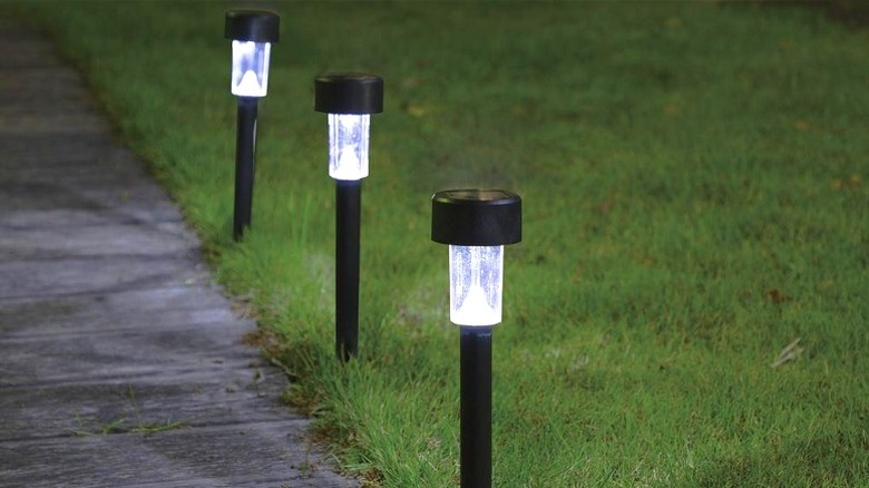 Patriot Lighting solar powered landscape lights lining a walking path