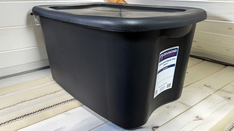 Diamond Plastics 18-gallon storage tote in a storage loft