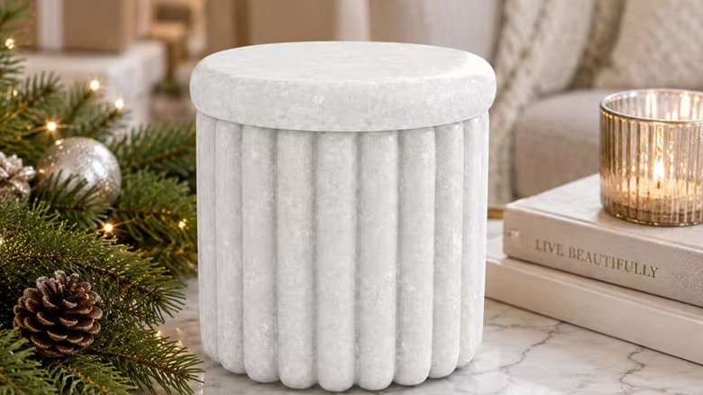 Michaels Evergreen Noel Scented Candle in fluted marble
