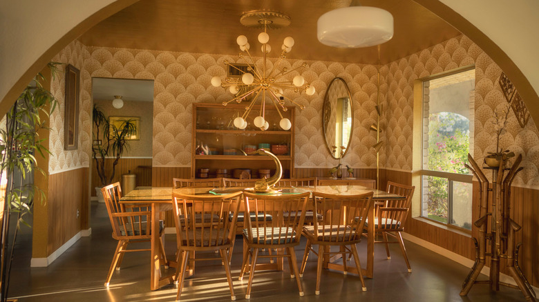 A Sputnik chandelier in a mid-century dining room