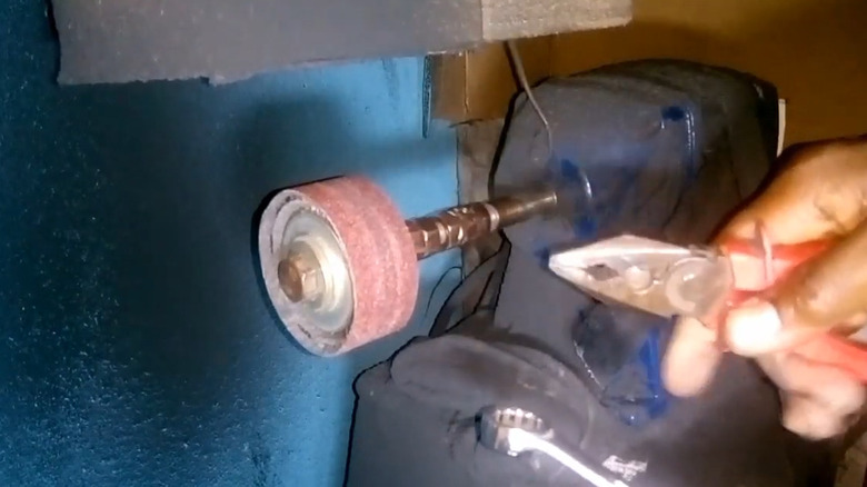 A shoemaking filing machine made with a bench grinder