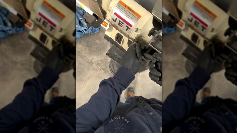 Cleaning rust from bolt threads with a bench grinder