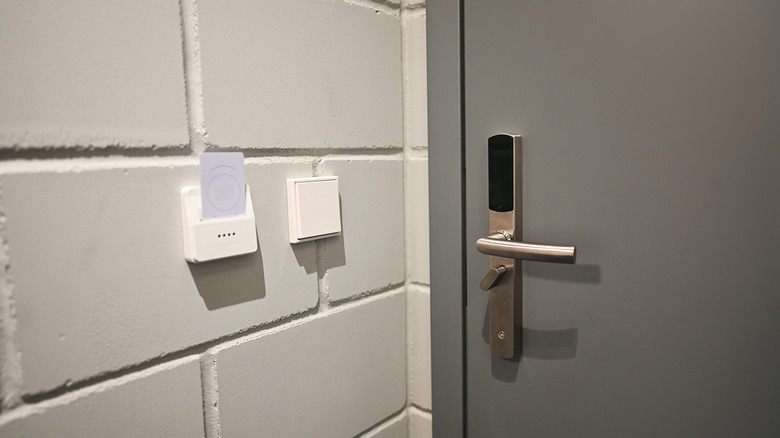 Wall-mounted wireless switch and card reader