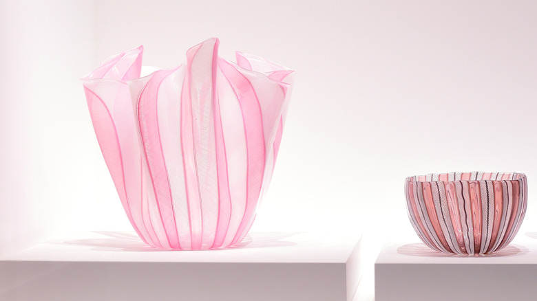 Murano Handkerchief Vase in pink (left) next to a glass bowl of the same brand