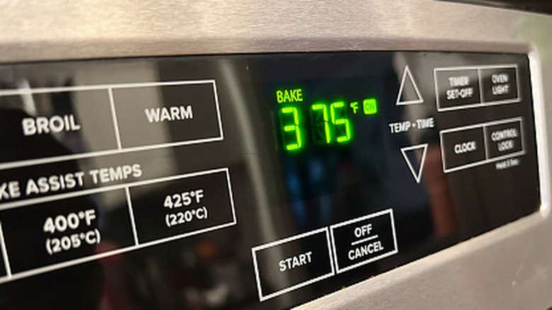 Oven display screen with the preheat temperature set to 375 degrees Fahrenheit