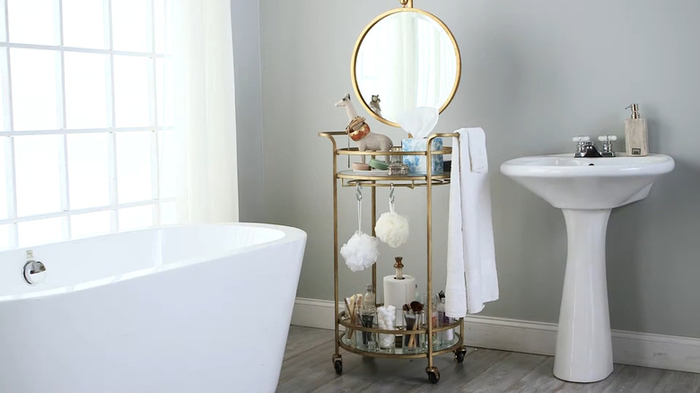 Bar cart turned into bathroom vanity storage station