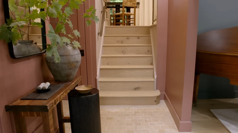 A cozy earth-toned entry way Nate Berkus and Jeremiah Brent designed for clients