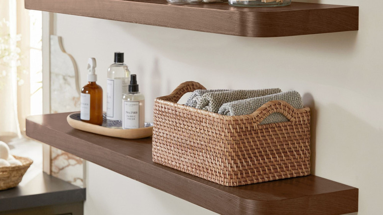 Floating shelves with baskets on them