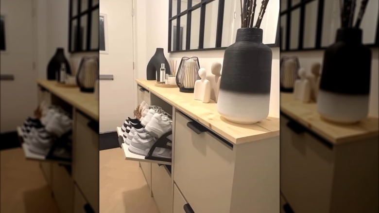 Light brown IKEA BISSA cabinet repurposed as shoe cabinet in modern entryway