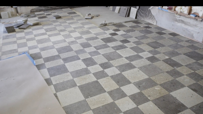 volcanic ash checkerboard flooring being restored