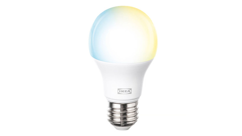 A smart KAJPLATS LED bulb from IKEA is shown in a detail shot