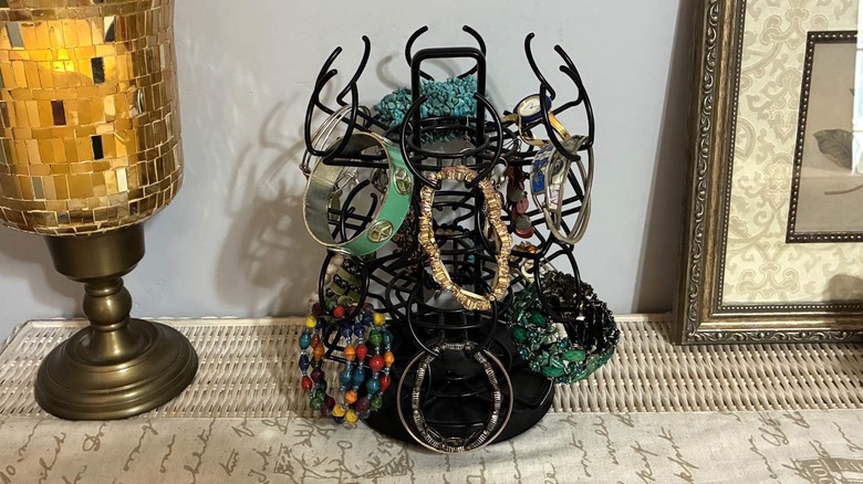 Rotating coffee pod carousel turned into jewelry organizer