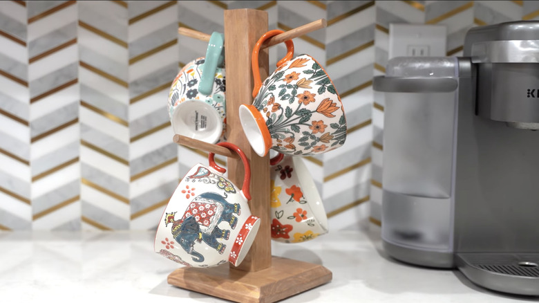 Mugs hanging from DIY tree