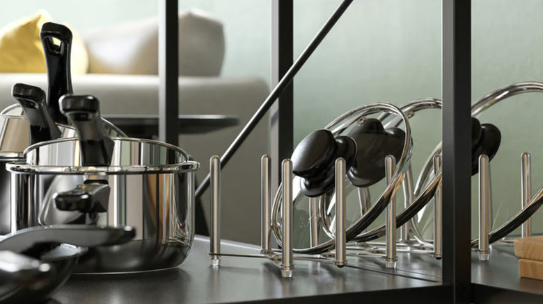 IKEA pot lid organizer on a metal shelf