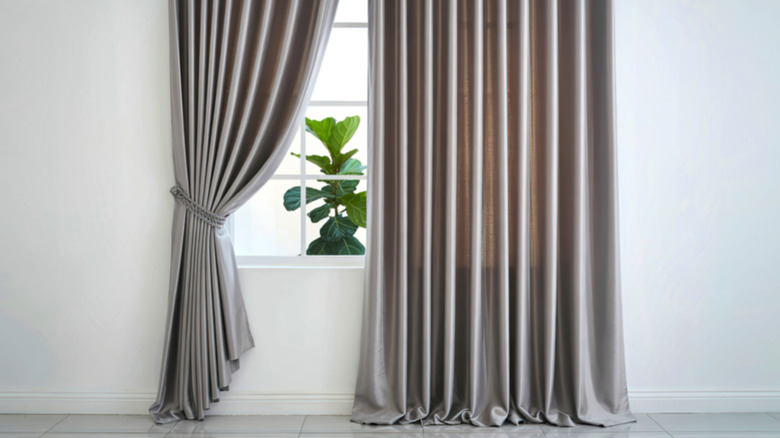 heavy gray drapery on a window