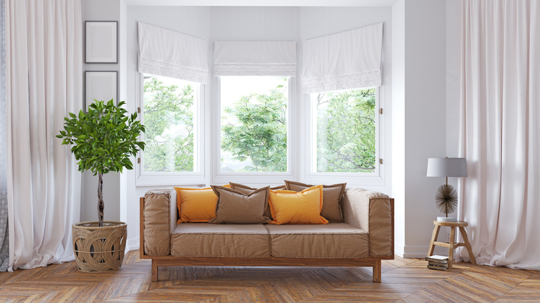 Modern living room with blinds and curtains