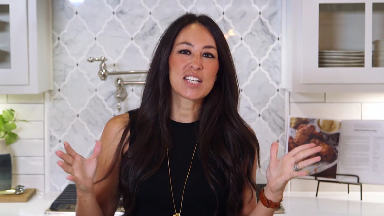 Joanna Gaines in a white kitchen