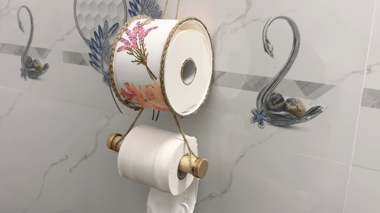Toilet paper rolls displayed in DIY floral holder