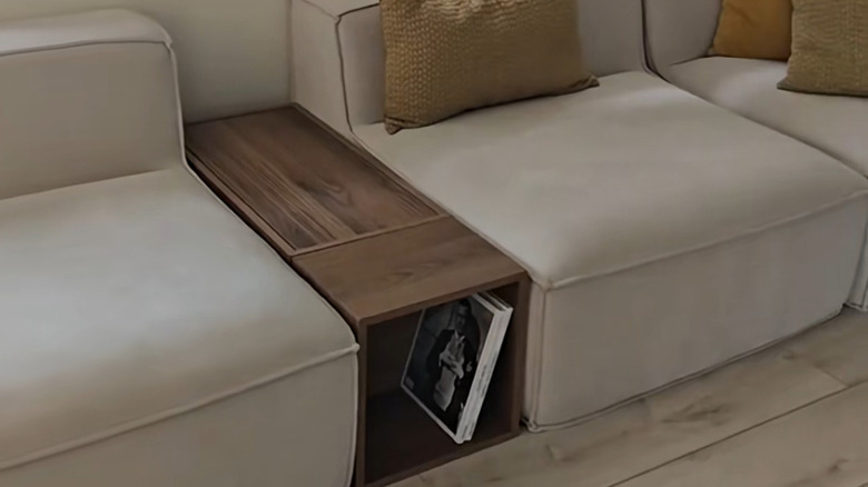 IKEA Hack with EKET cabinets between modular couch sections