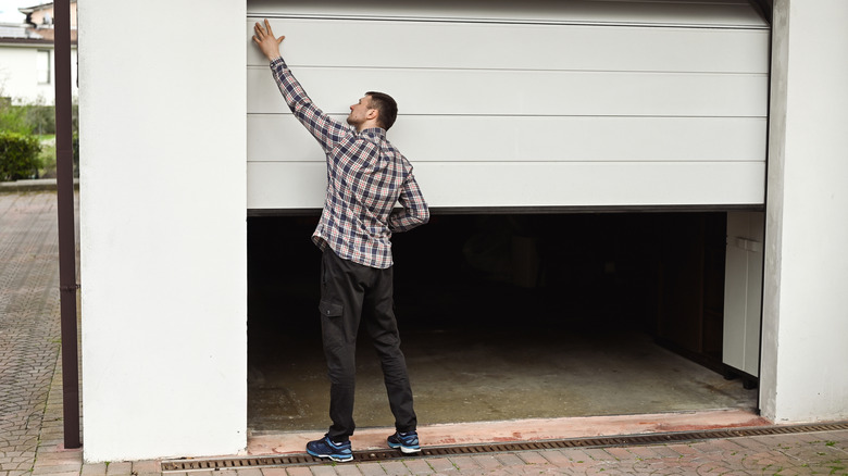 man with garage door