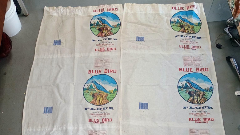 Vintage flour sack hanging in a museum.