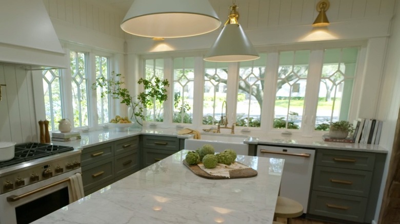 Windows inside of a kitchen with diamond-shaped mullions