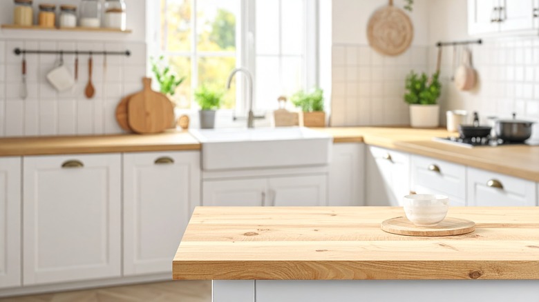 A bright kitchen with butcher block countertops
