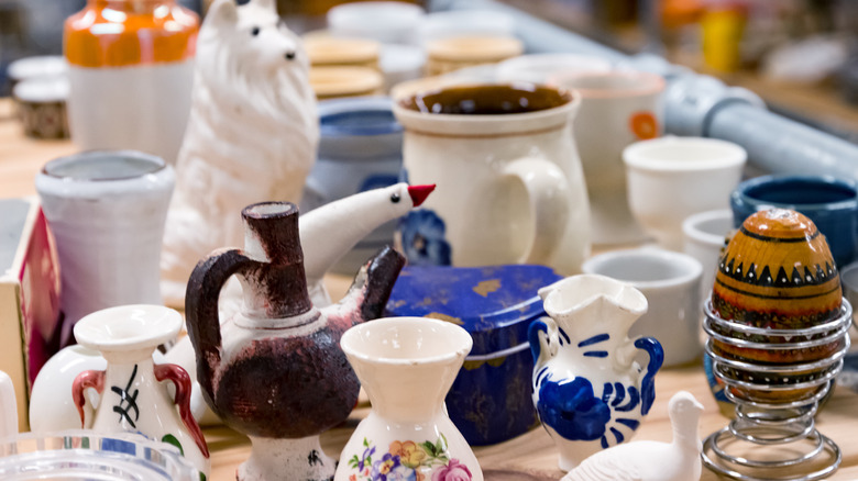 Various cute kitchen items in a thrift store