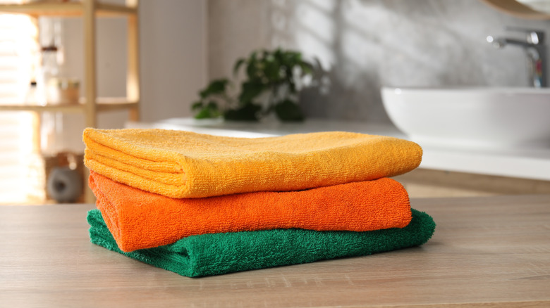 Stacked towels in a bathroom
