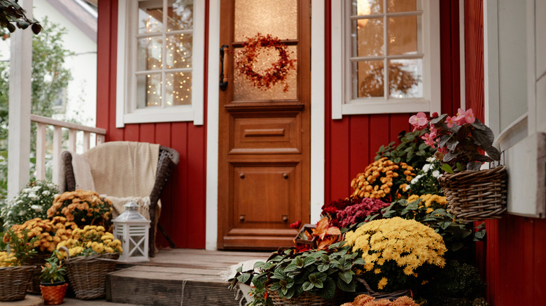 Autumn wreath and decor on a front porch