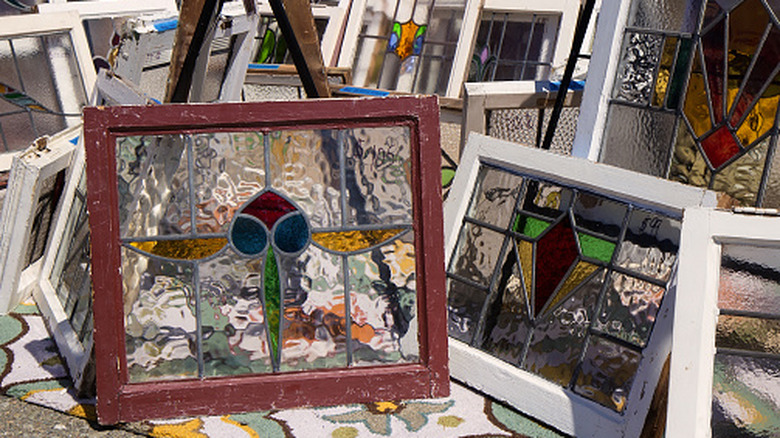 Secondhand stained glass panels at a flea market