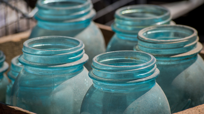 Set of five blue canning jar lids