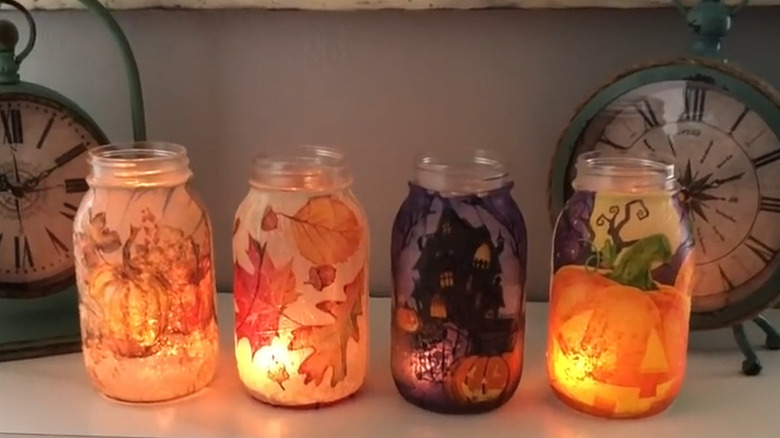 Fall-themed luminaries made from Mason jars