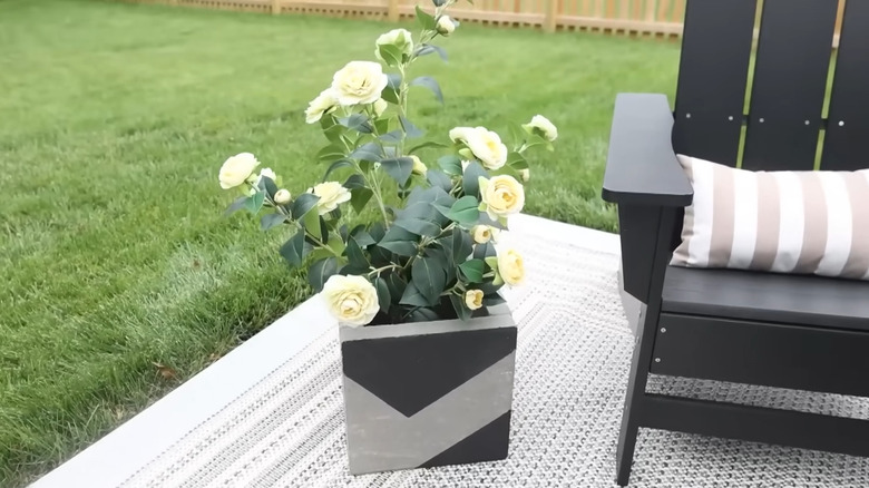 A cache pot for the patio made from pavers
