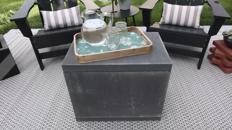 A patio coffee table made from pavers