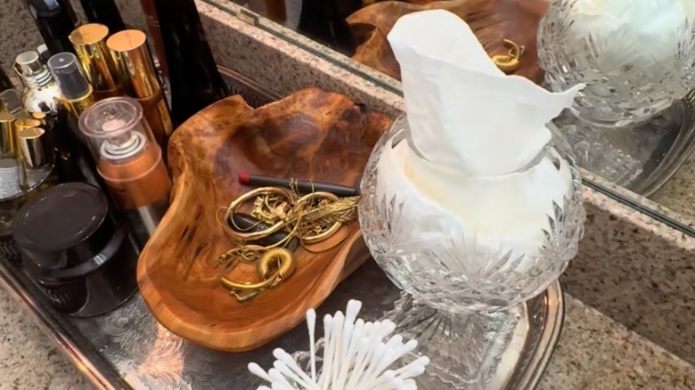 Round crystal vase reused as a tissue holder