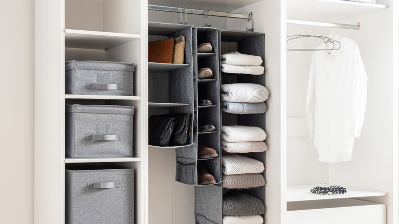 Organized closet with hanging cube organizer