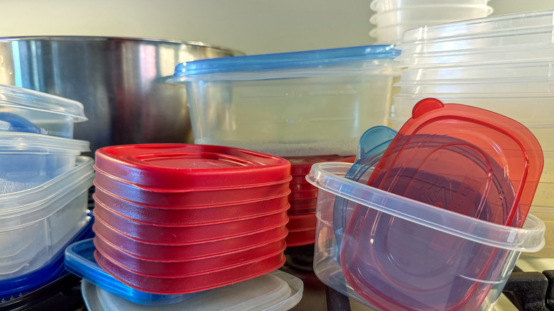 Collection of food containers sitting on a countertop