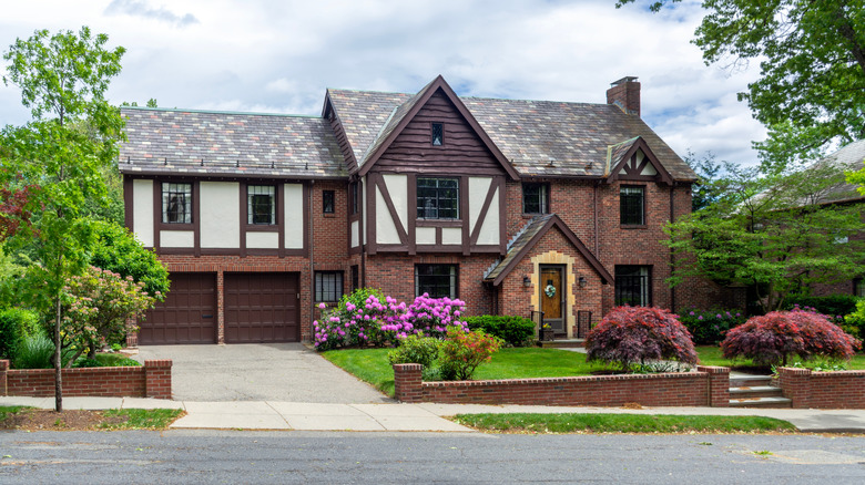 Tudor style house with brick