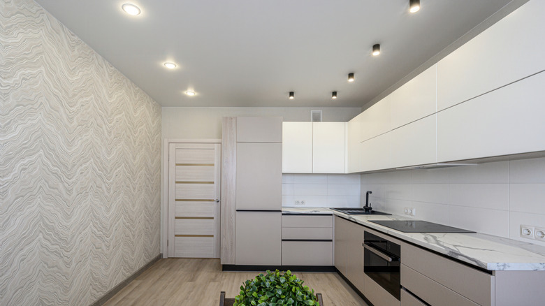 Modern kitchen with only recessed lighting
