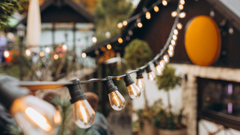 Hanging outdoor string lights over a patio