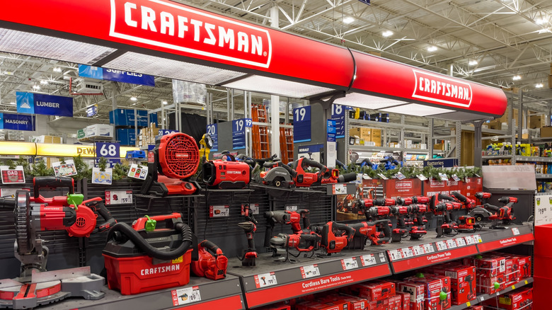 A large selection of Craftsman tools on display at a home improvement store