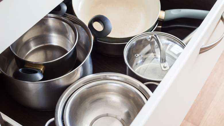 pots and pans in a drawer